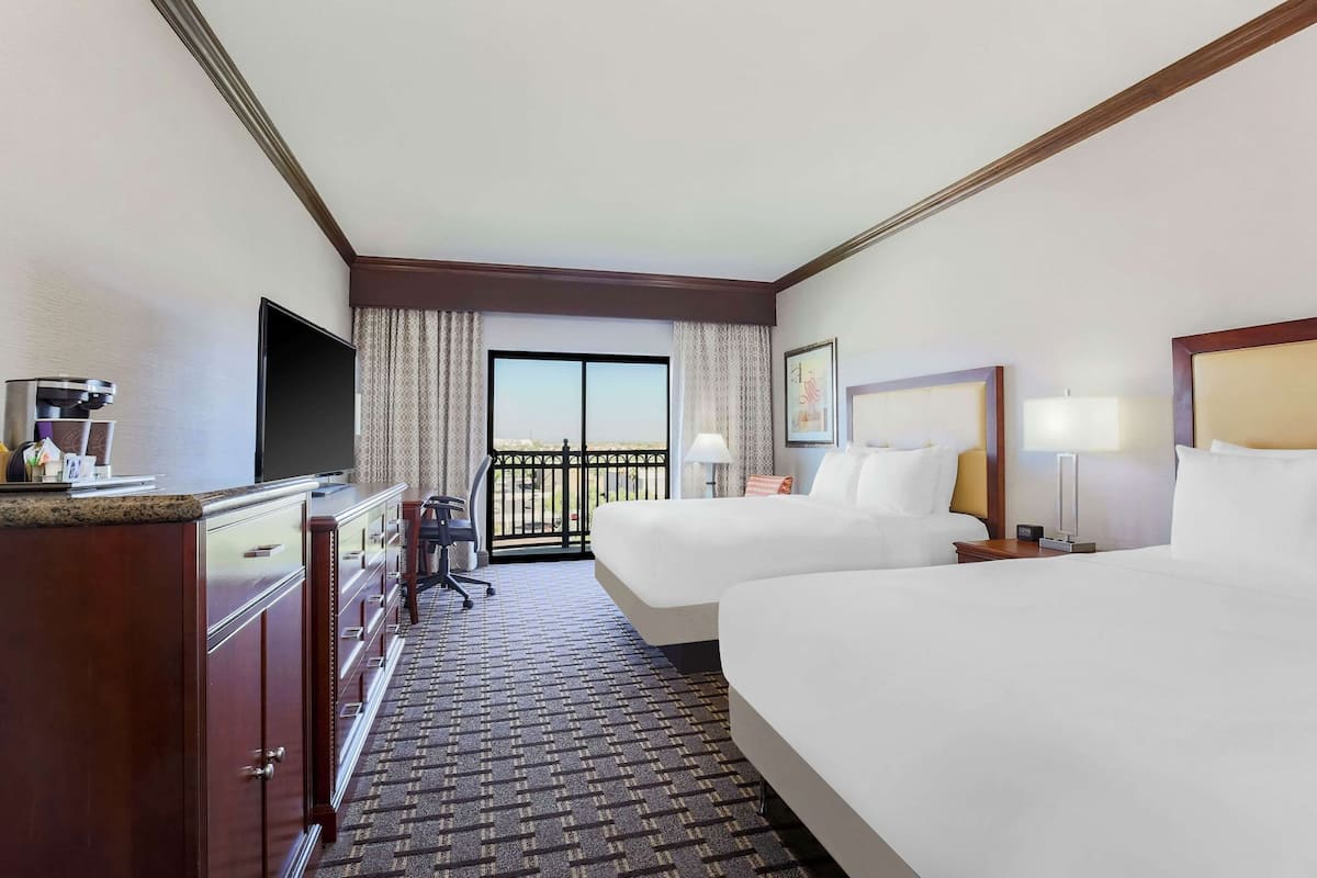 Premium bedding, down duvets, pillow-top beds, in-room safe