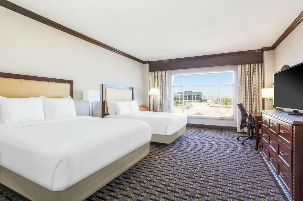 Premium bedding, down comforters, pillowtop beds, in-room safe