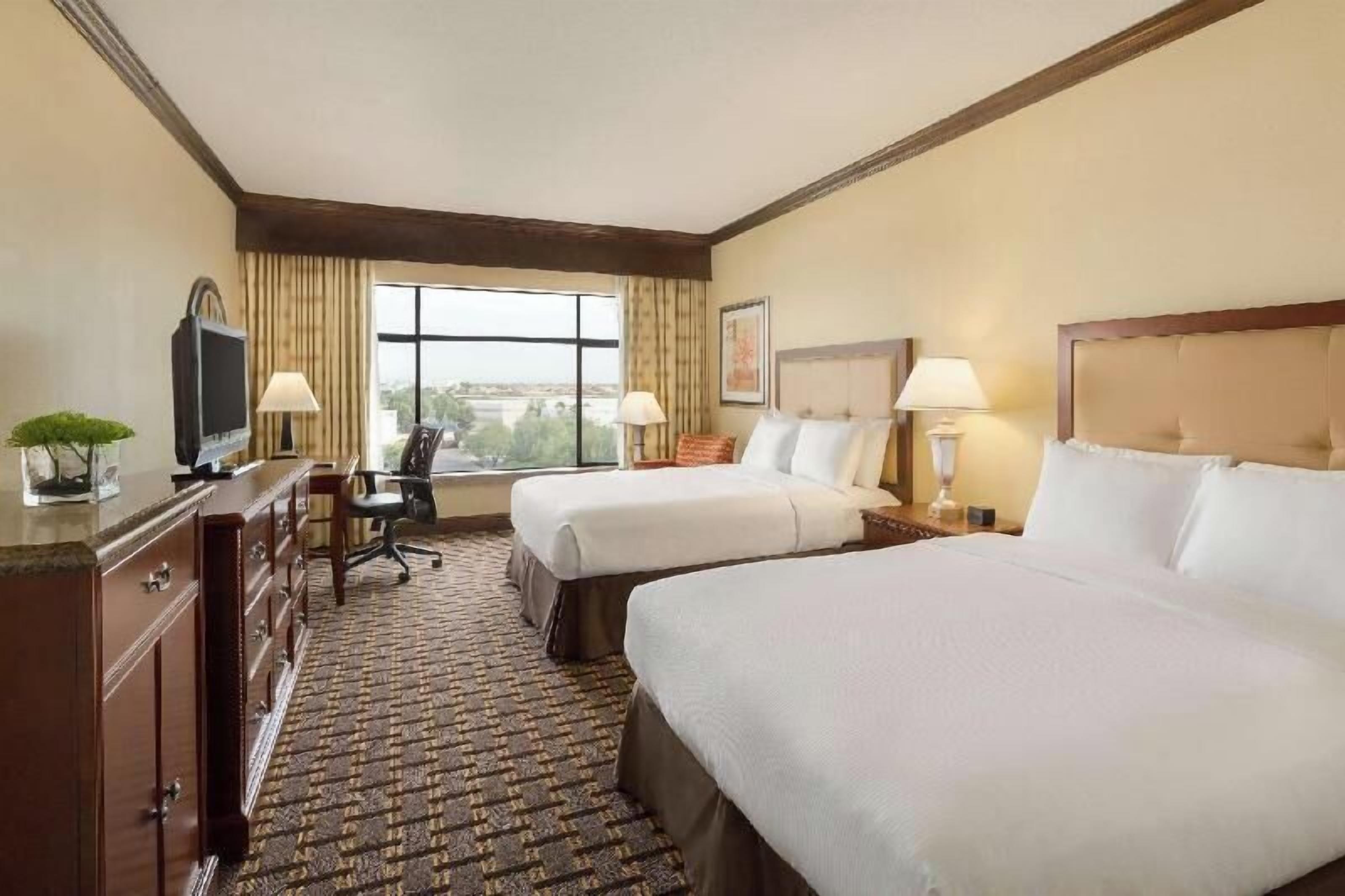 Premium bedding, down comforters, pillowtop beds, in-room safe