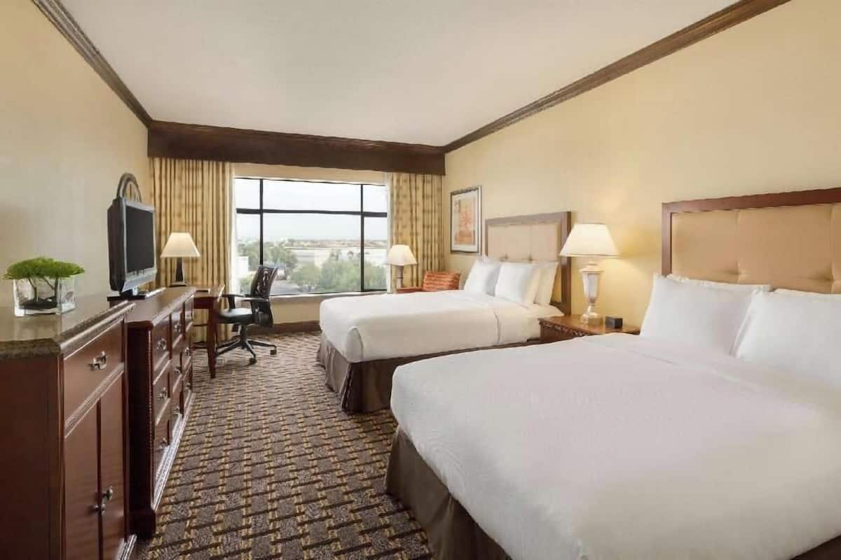 Premium bedding, down duvets, pillow-top beds, in-room safe