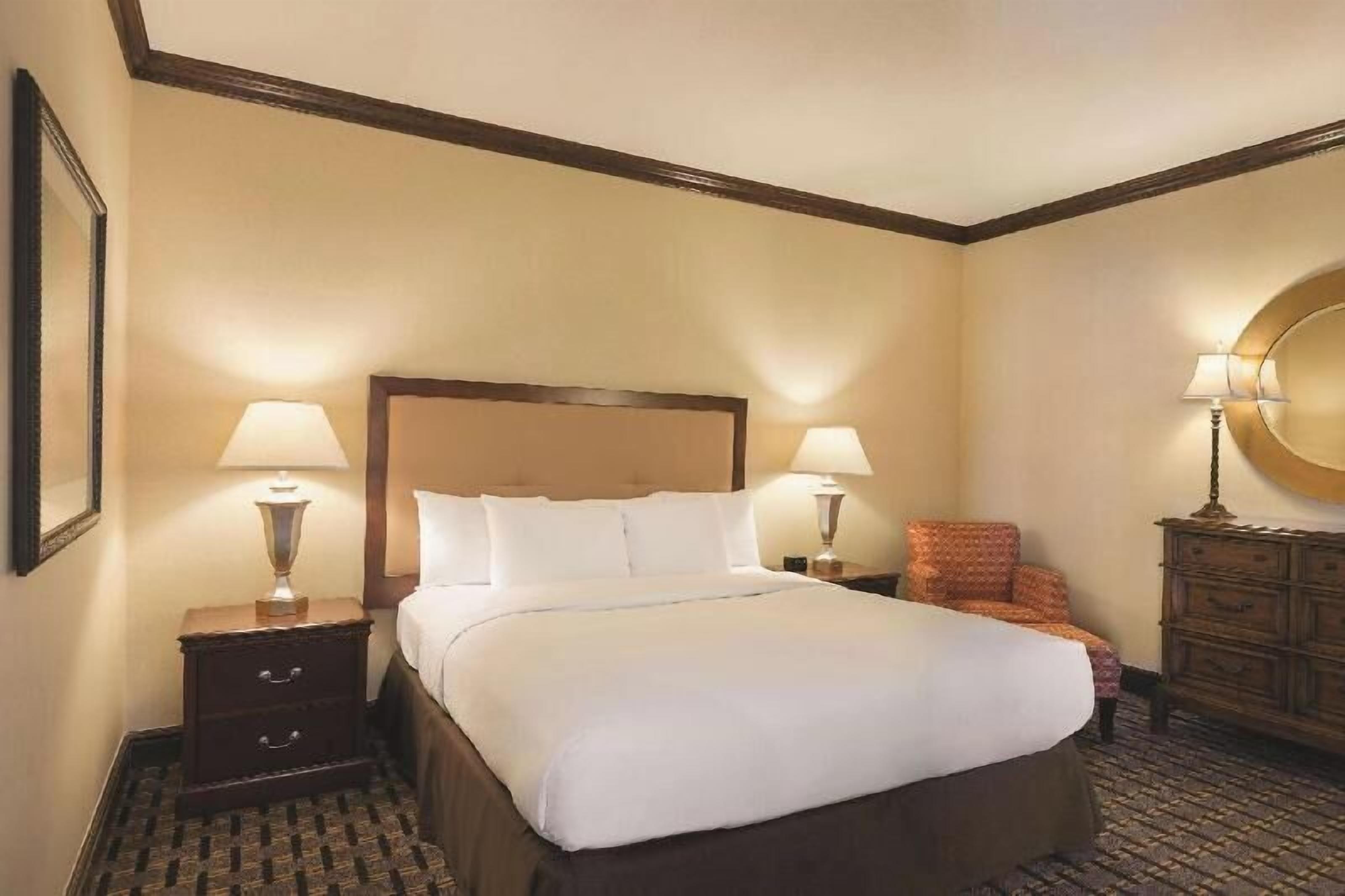 Premium bedding, down comforters, pillowtop beds, in-room safe