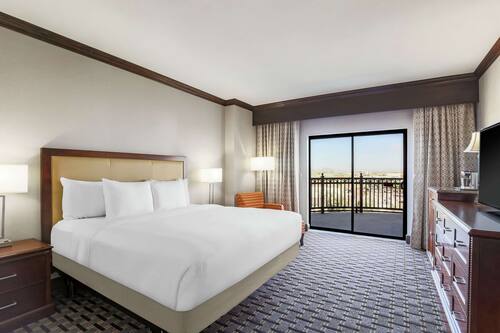 Suite, 1 King Bed (2 Rooms) | Premium bedding, down comforters, pillowtop beds, in-room safe