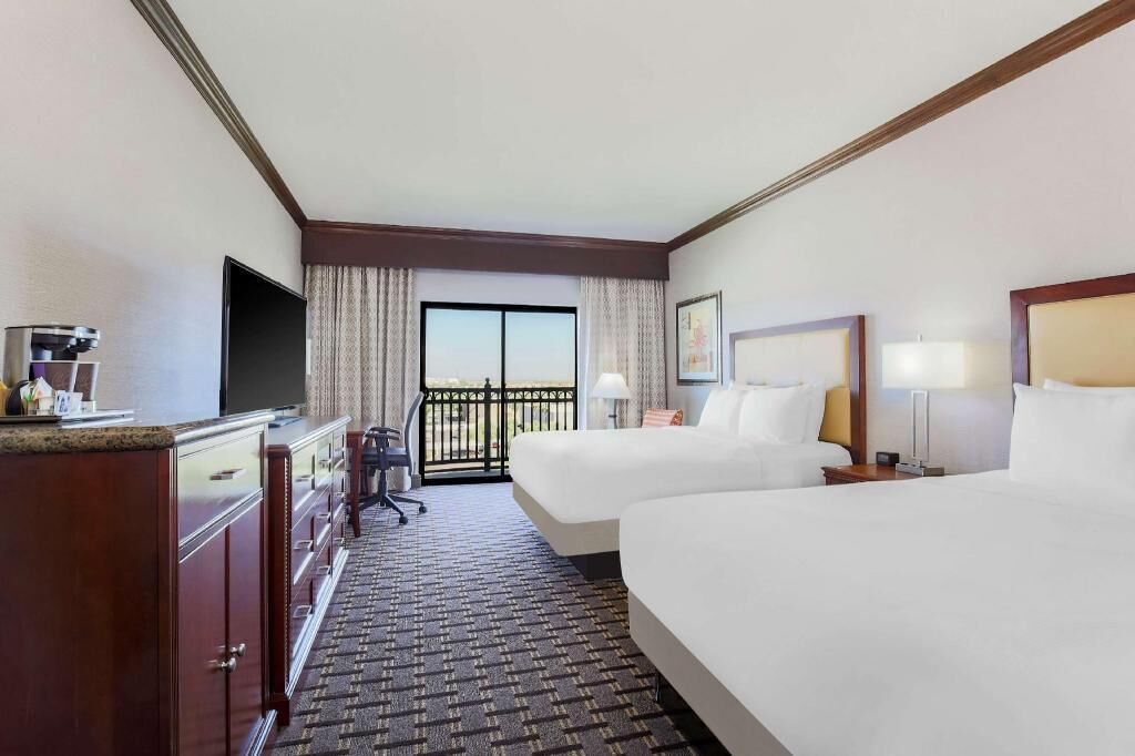Premium bedding, down comforters, pillowtop beds, in-room safe