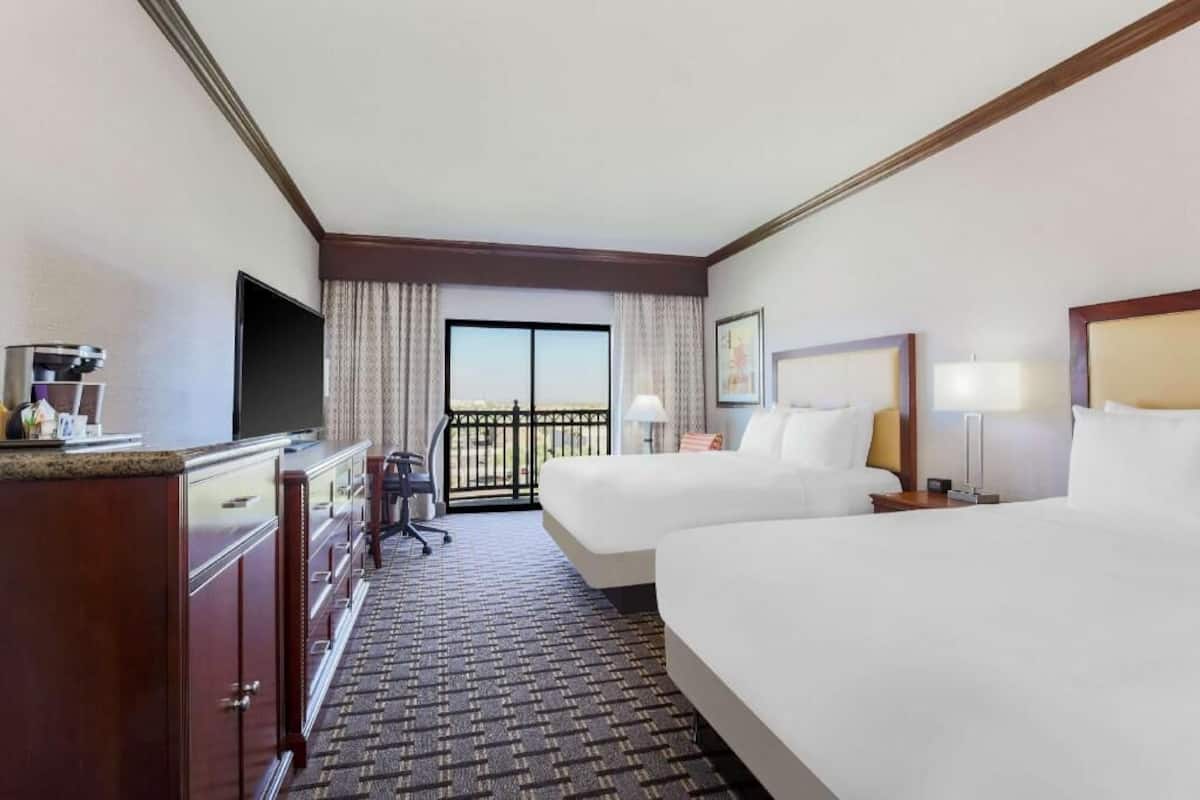 Premium bedding, down duvets, pillow-top beds, in-room safe