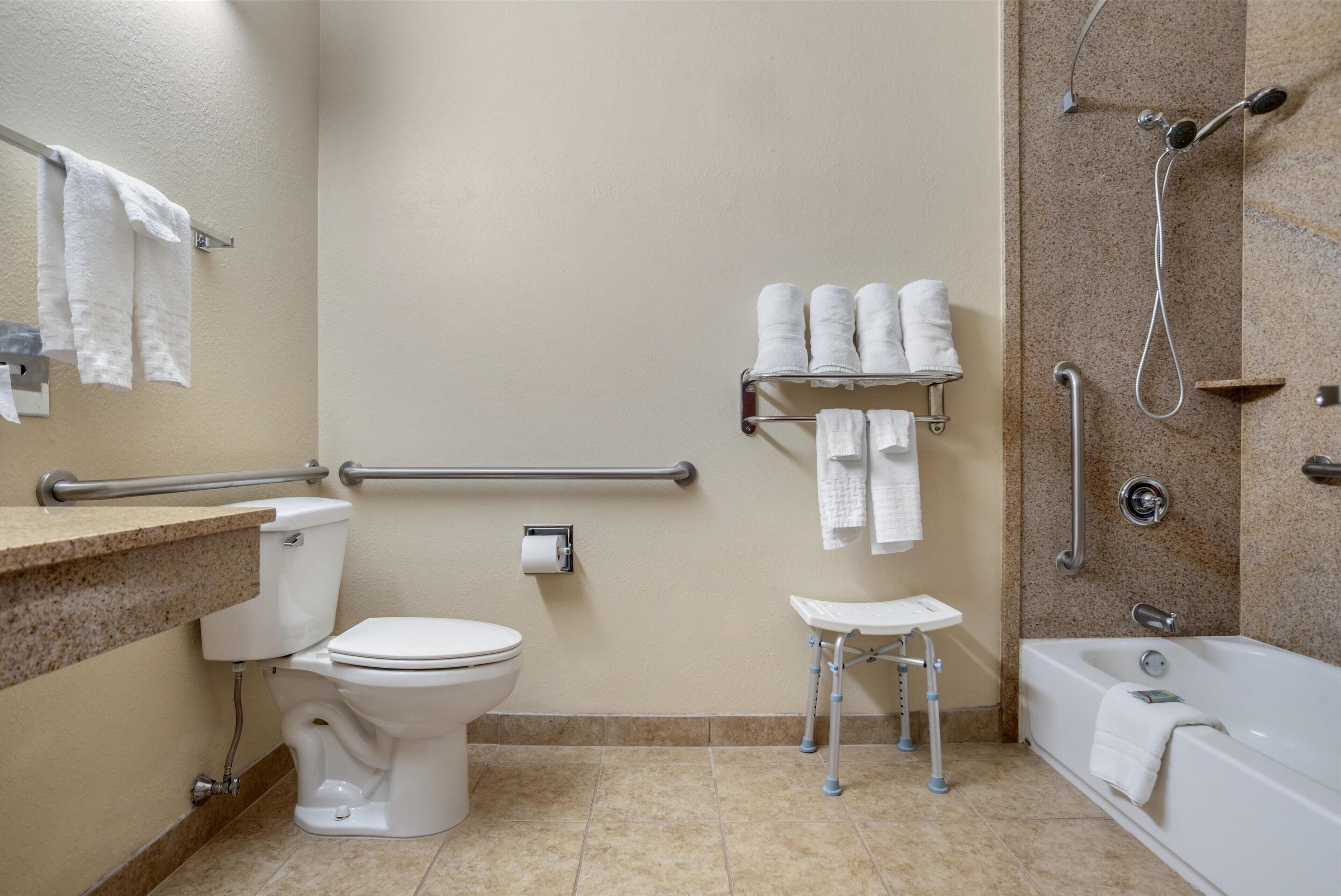 standard room, 2 queen beds, accessible, refrigerator & microwave (with single sofabed) | bathroom | combined shower/bathtub, free toiletries, hair dryer, towels