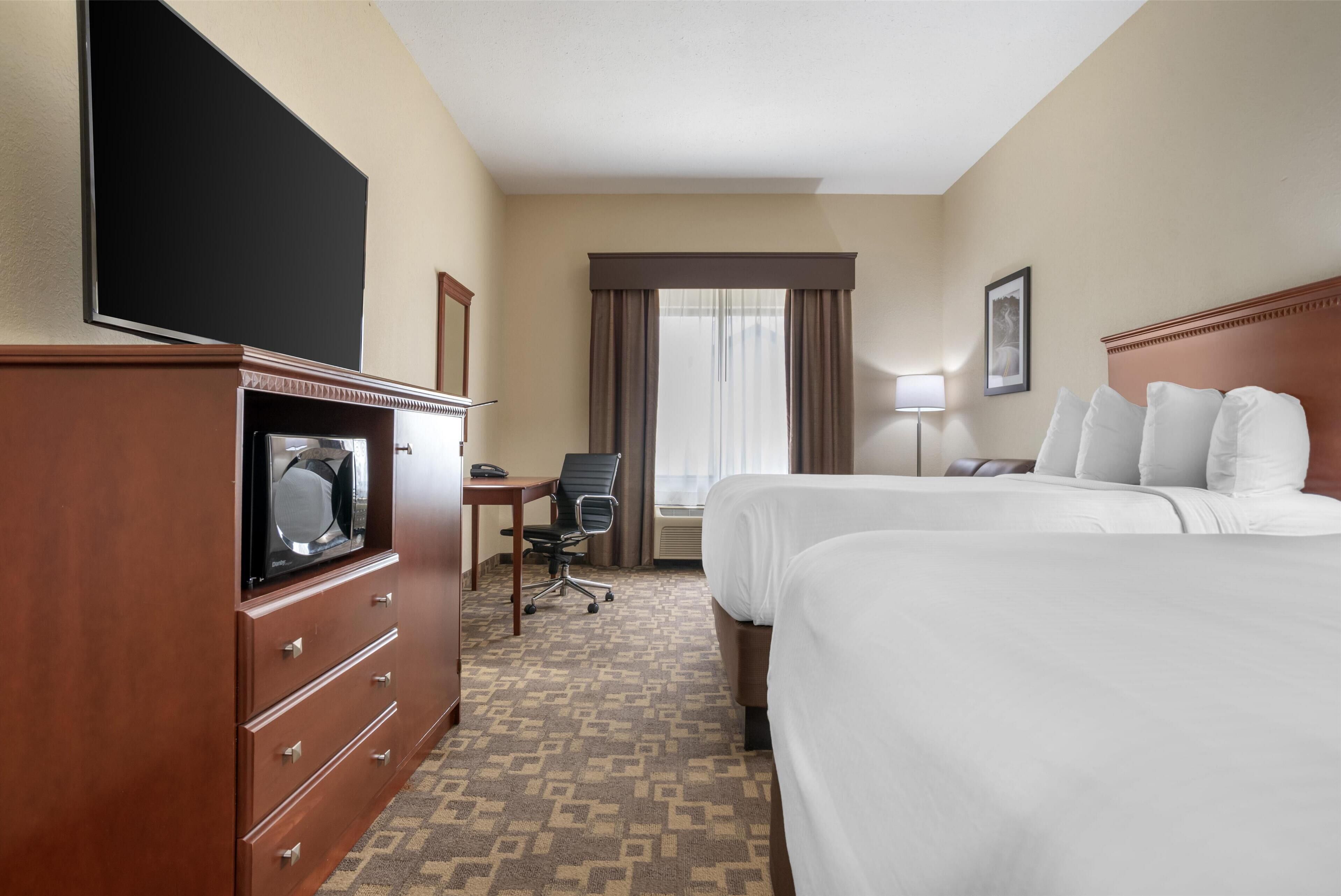 standard room, 2 queen beds, non smoking, refrigerator & microwave (with single sofabed) | 1 bedroom, pillow-top beds, desk, laptop workspace