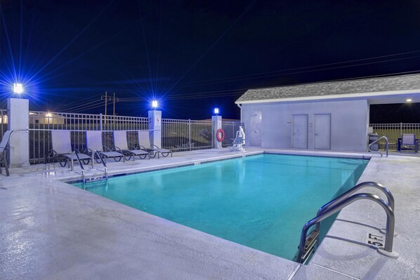 Outdoor pool, open 9:00 AM to 9:00 PM, pool umbrellas, pool loungers