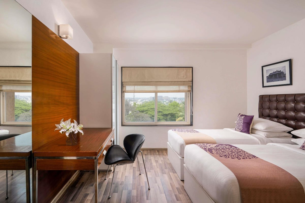 Suite, 2 Bedrooms, Balcony | Egyptian cotton sheets, premium bedding, down comforters, minibar
