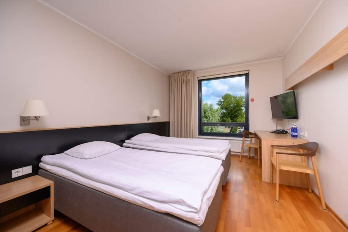 Hypo-allergenic bedding, desk, laptop workspace, soundproofing