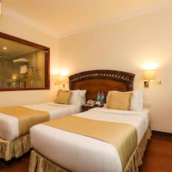 Deluxe Room | 1 bilik tidur, peralatan tempat tidur premium, bar mini