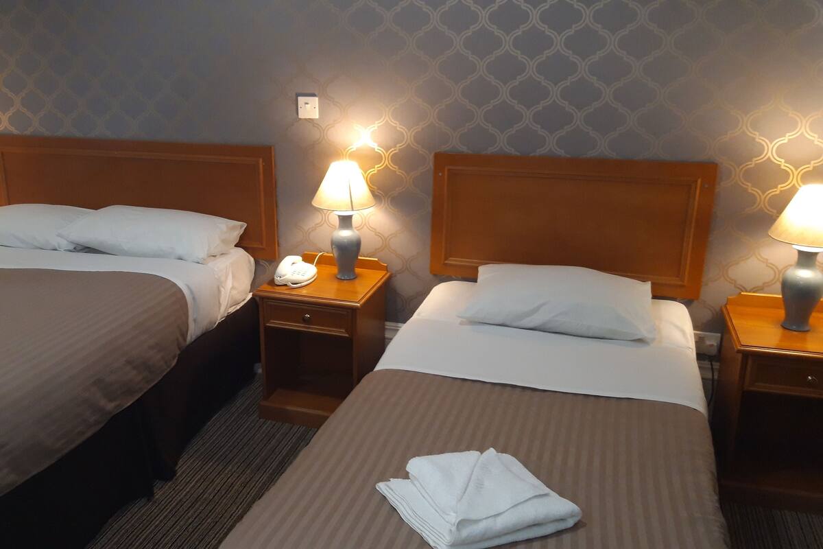 Family Room | Desk, iron/ironing board (on request), WiFi (free), bed sheets