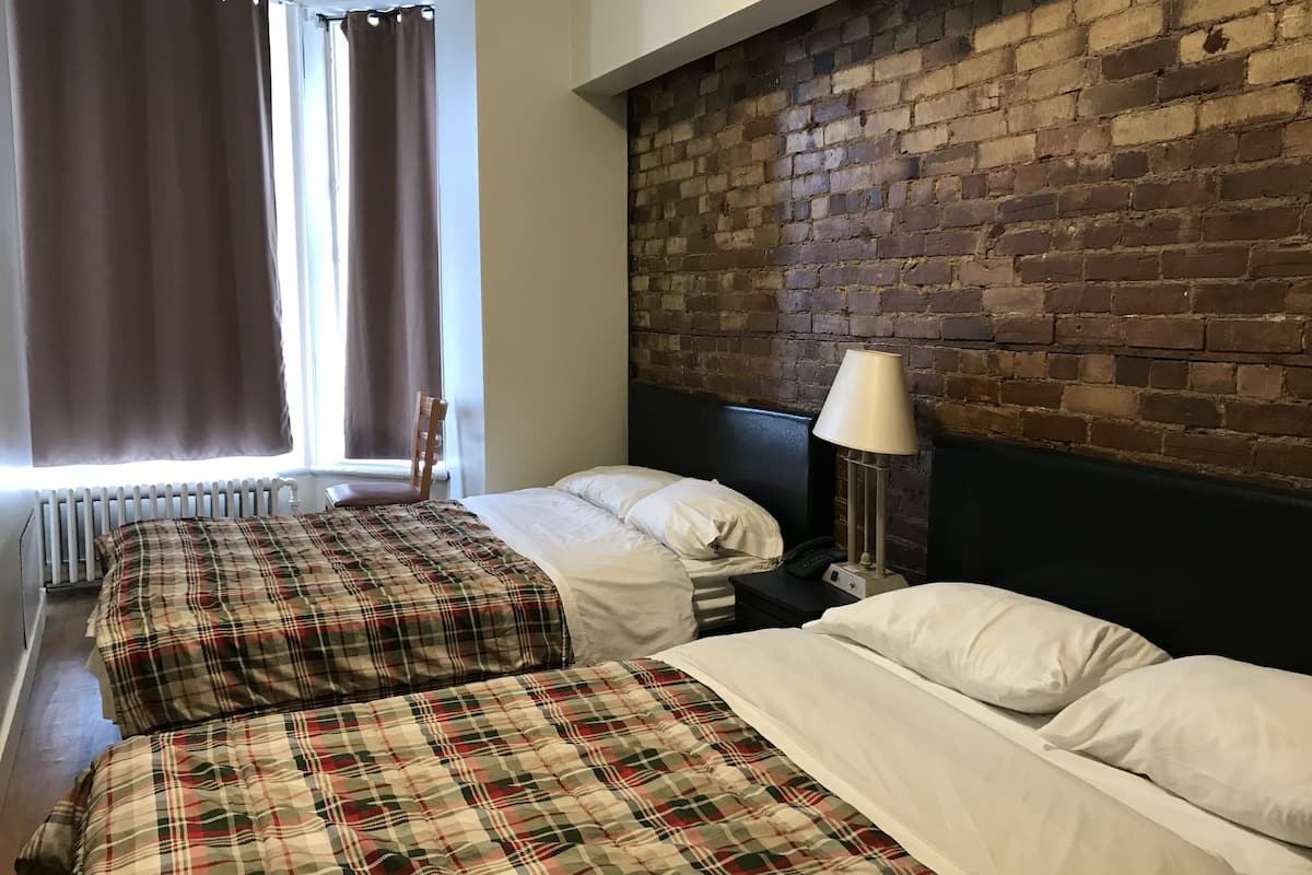 Standard Room, 2 Double Beds | Individually decorated, desk, rollaway beds, free WiFi