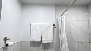 Shower, free toiletries, hair dryer, towels