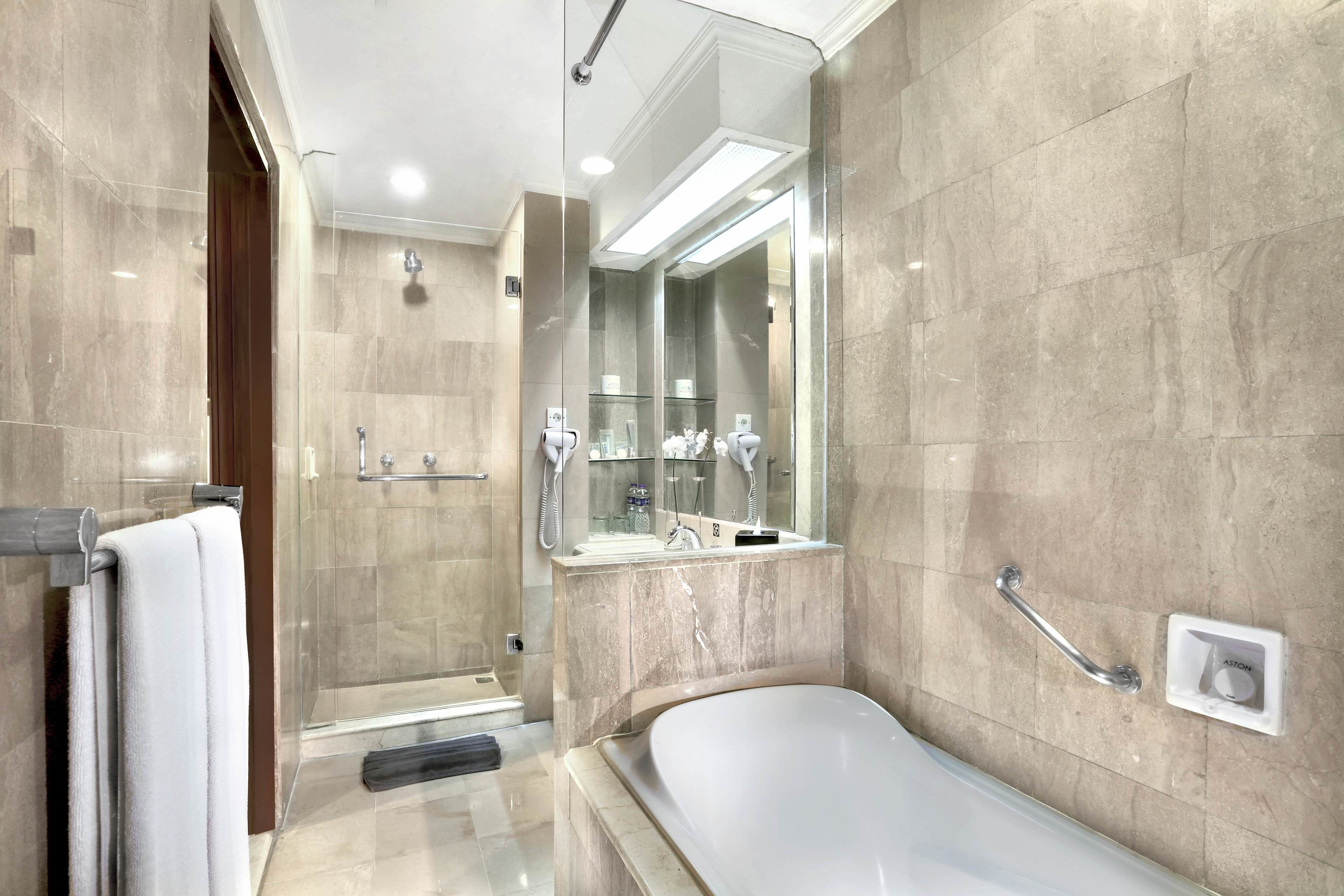 executive suite | bathroom | shower, free toiletries, hair dryer, bathrobes