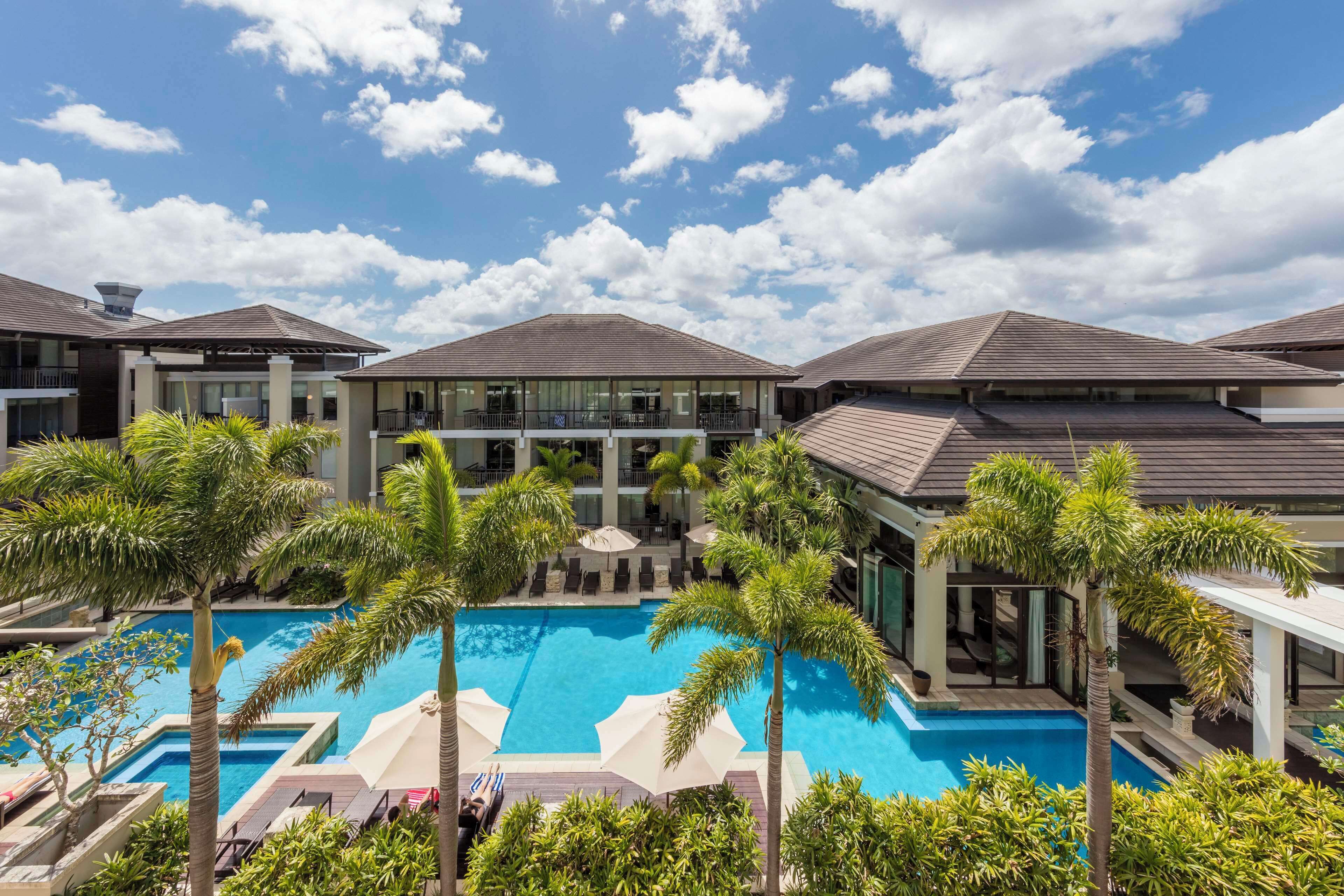 Outdoor pool, open 7:00 AM to 9:00 PM, pool umbrellas, pool loungers