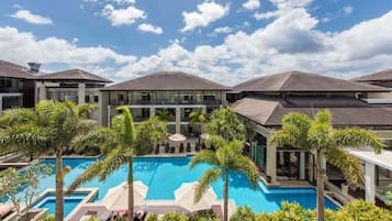 Outdoor pool, open 7:00 AM to 9:00 PM, pool umbrellas, pool loungers