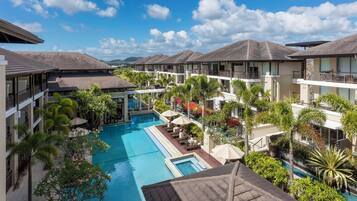 Outdoor pool, open 7:00 AM to 9:00 PM, pool umbrellas, pool loungers