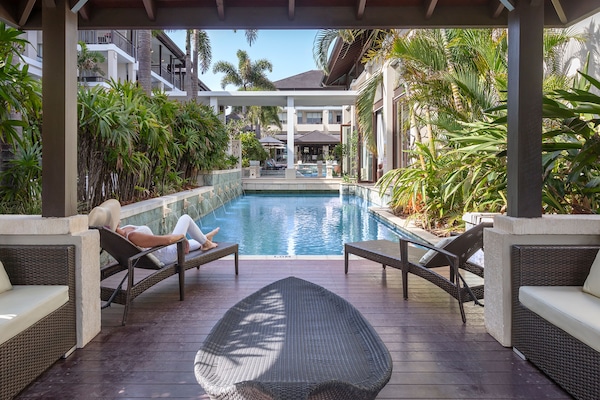 Outdoor pool, open 7:00 AM to 9:00 PM, pool umbrellas, pool loungers