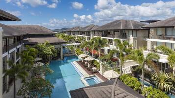 Outdoor pool, open 7:00 AM to 9:00 PM, pool umbrellas, pool loungers