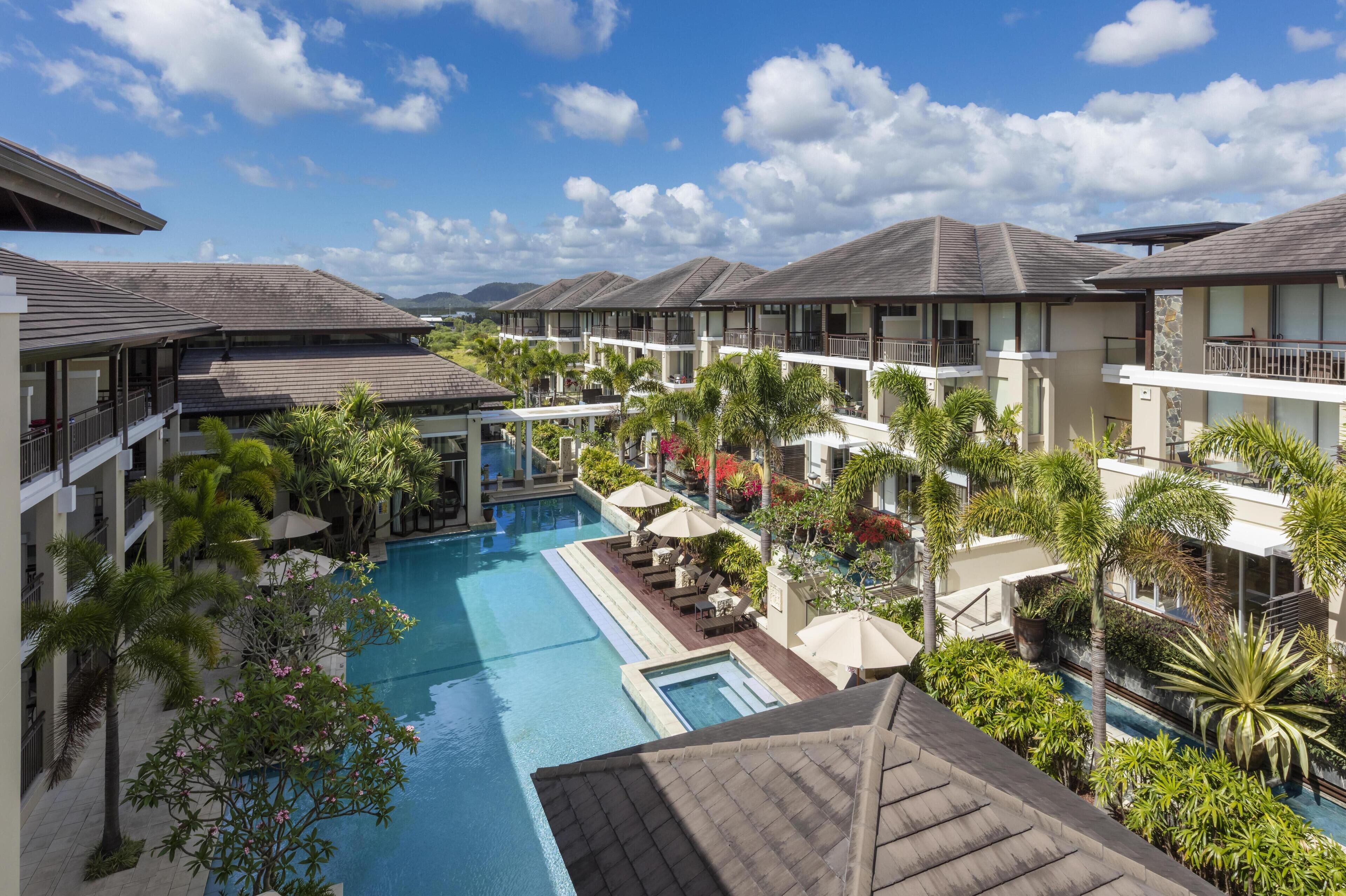 Outdoor pool, open 7:00 AM to 9:00 PM, pool umbrellas, pool loungers