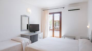 Colchones Select Comfort, minibar y caja de seguridad en la habitación