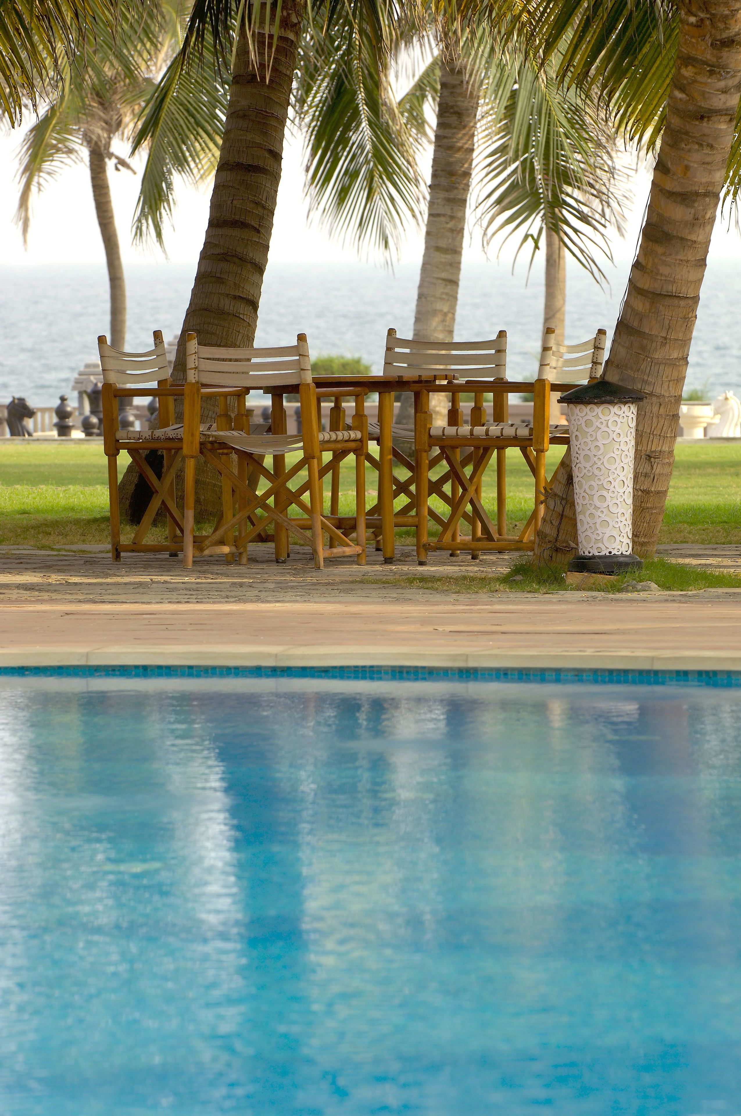 Outdoor pool, open 6 AM to 8 PM, free cabanas, pool umbrellas