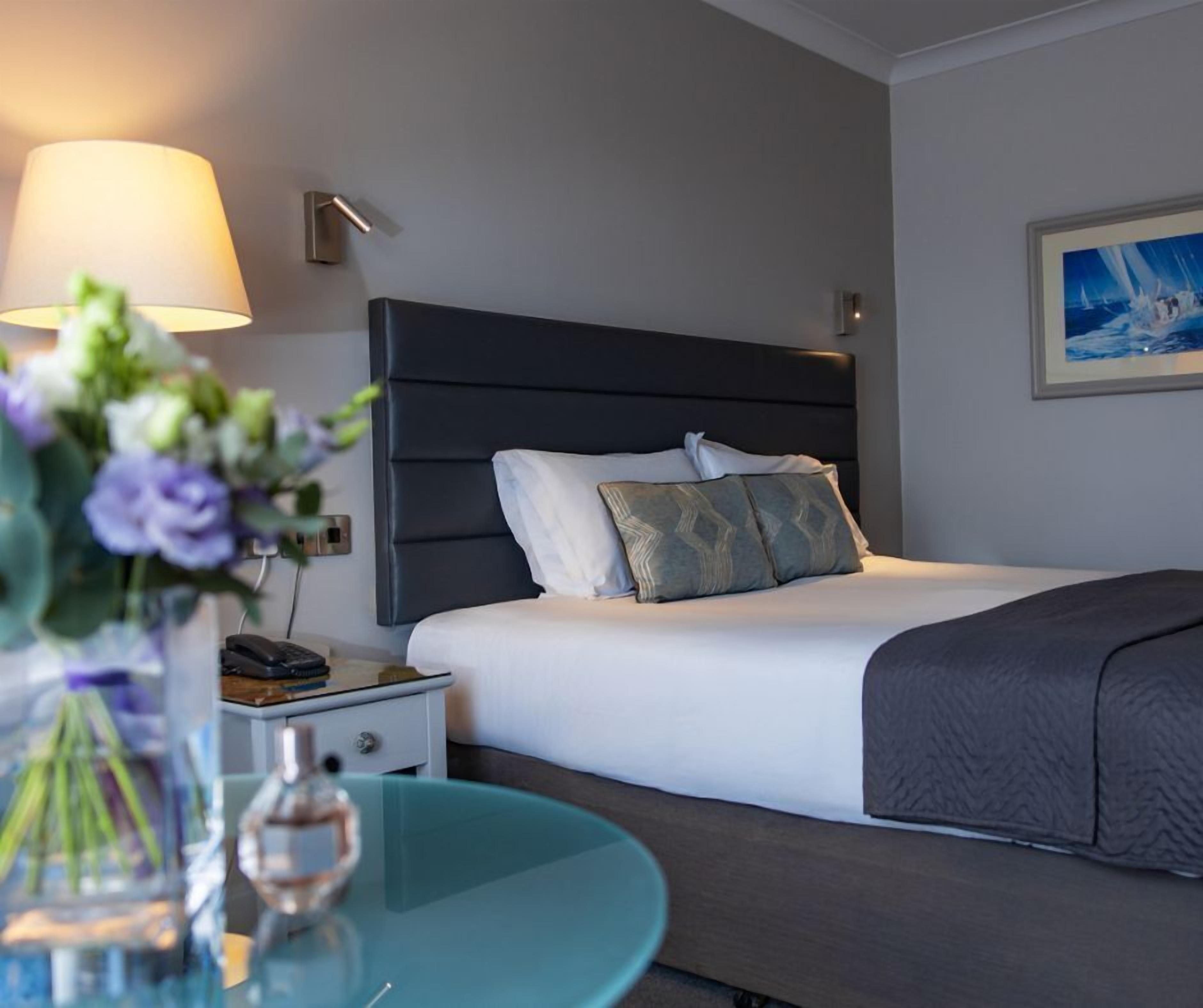 Individually furnished, desk, laptop workspace, iron/ironing board