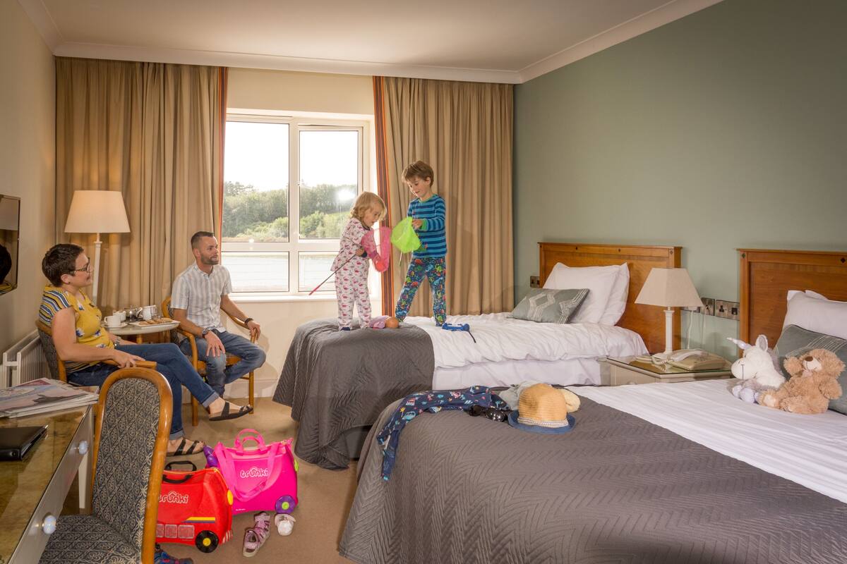 individually furnished, desk, laptop workspace, iron/ironing board