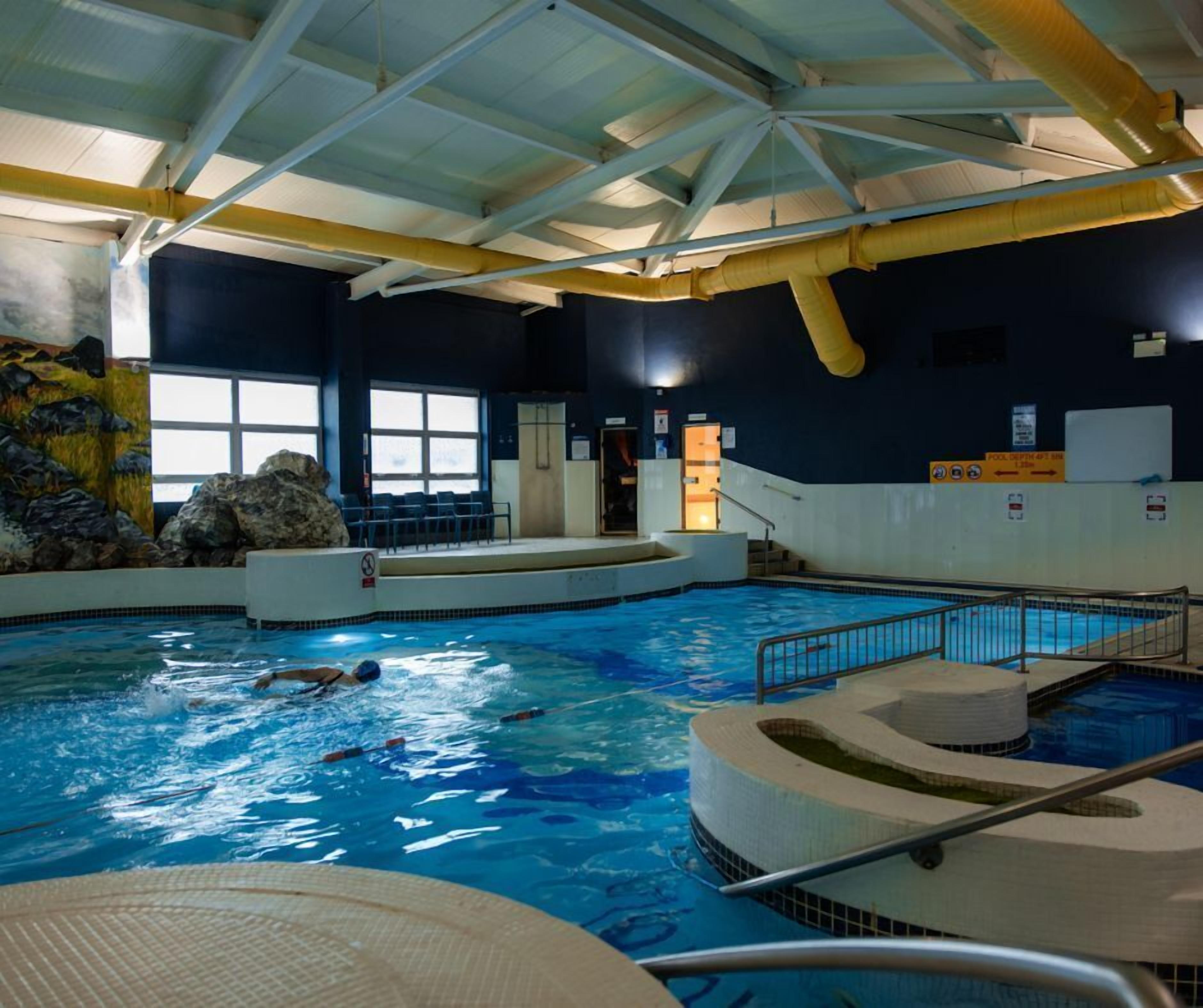 Indoor pool, open 8:00 AM to 8:00 PM, lifeguards on site