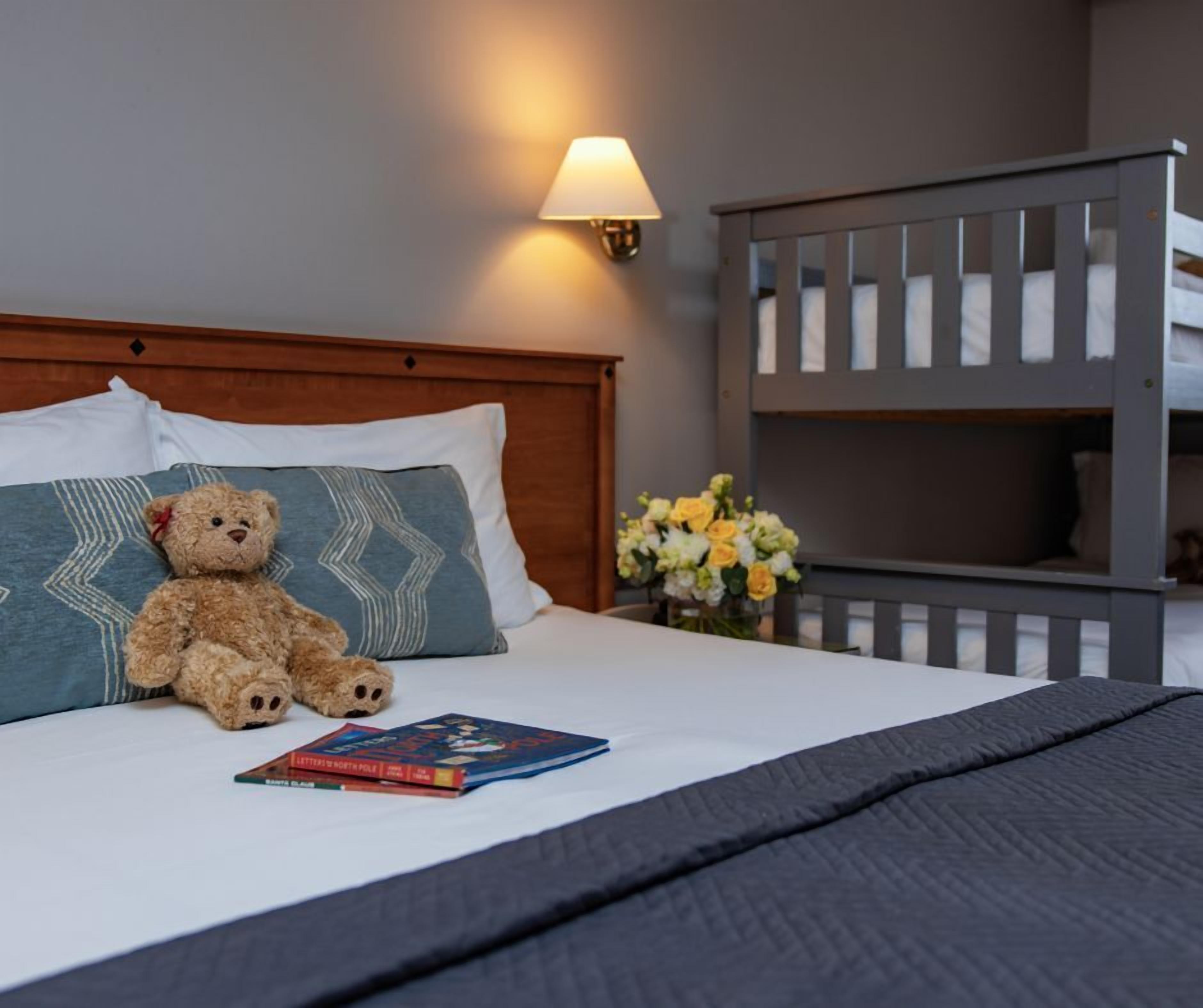 Individually furnished, desk, laptop workspace, iron/ironing board