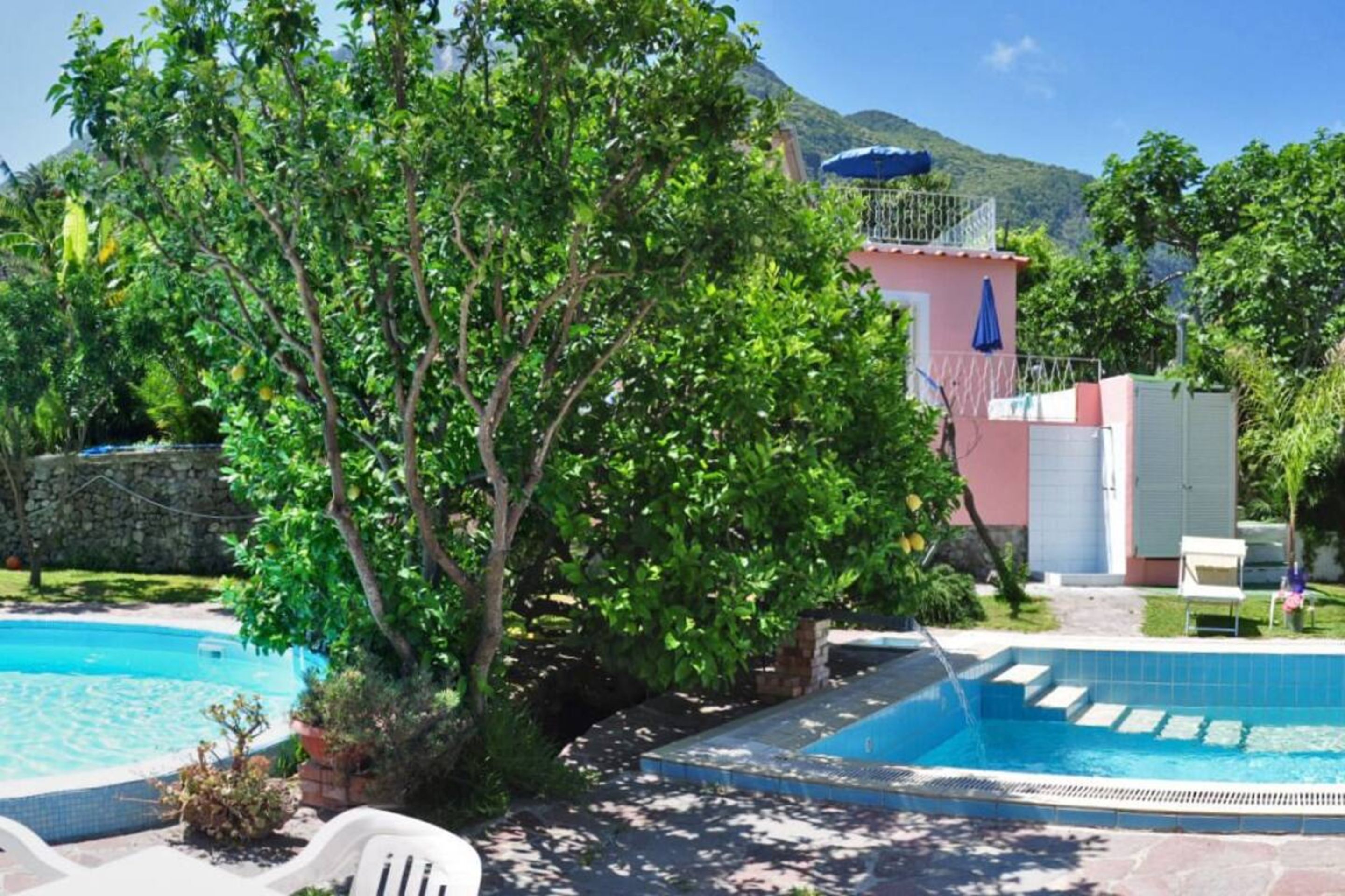Indoor pool, seasonal outdoor pool, pool umbrellas, pool loungers