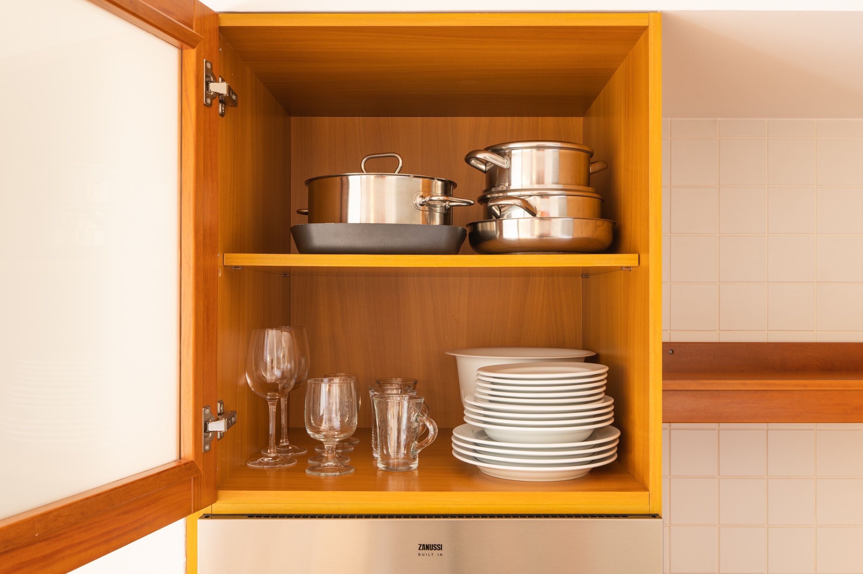 mini-fridge, microwave, stovetop, electric kettle