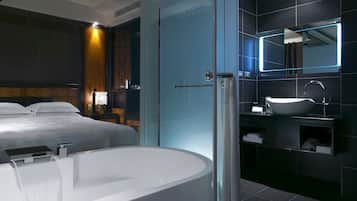 Separate tub and shower, rainfall showerhead, free toiletries