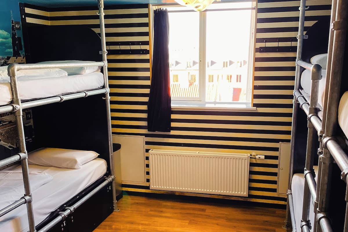 One Bed in a 8-12 Bed Mixed Dorm - Shared Bathroom | Iron/ironing board, free WiFi, bed sheets