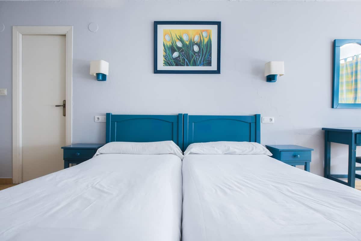 Desk, free WiFi, bed sheets