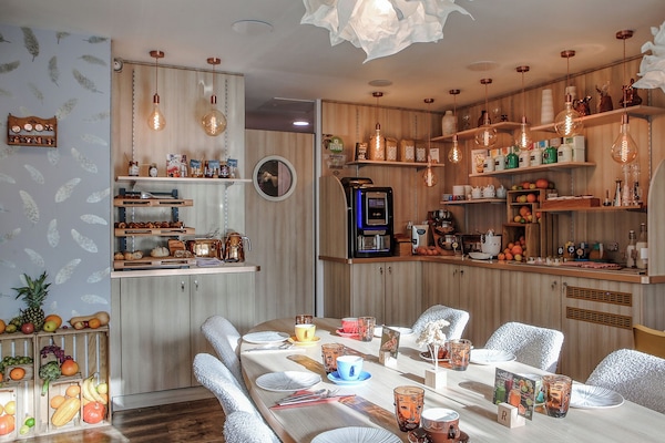 Daily buffet breakfast (EUR 16 per person)