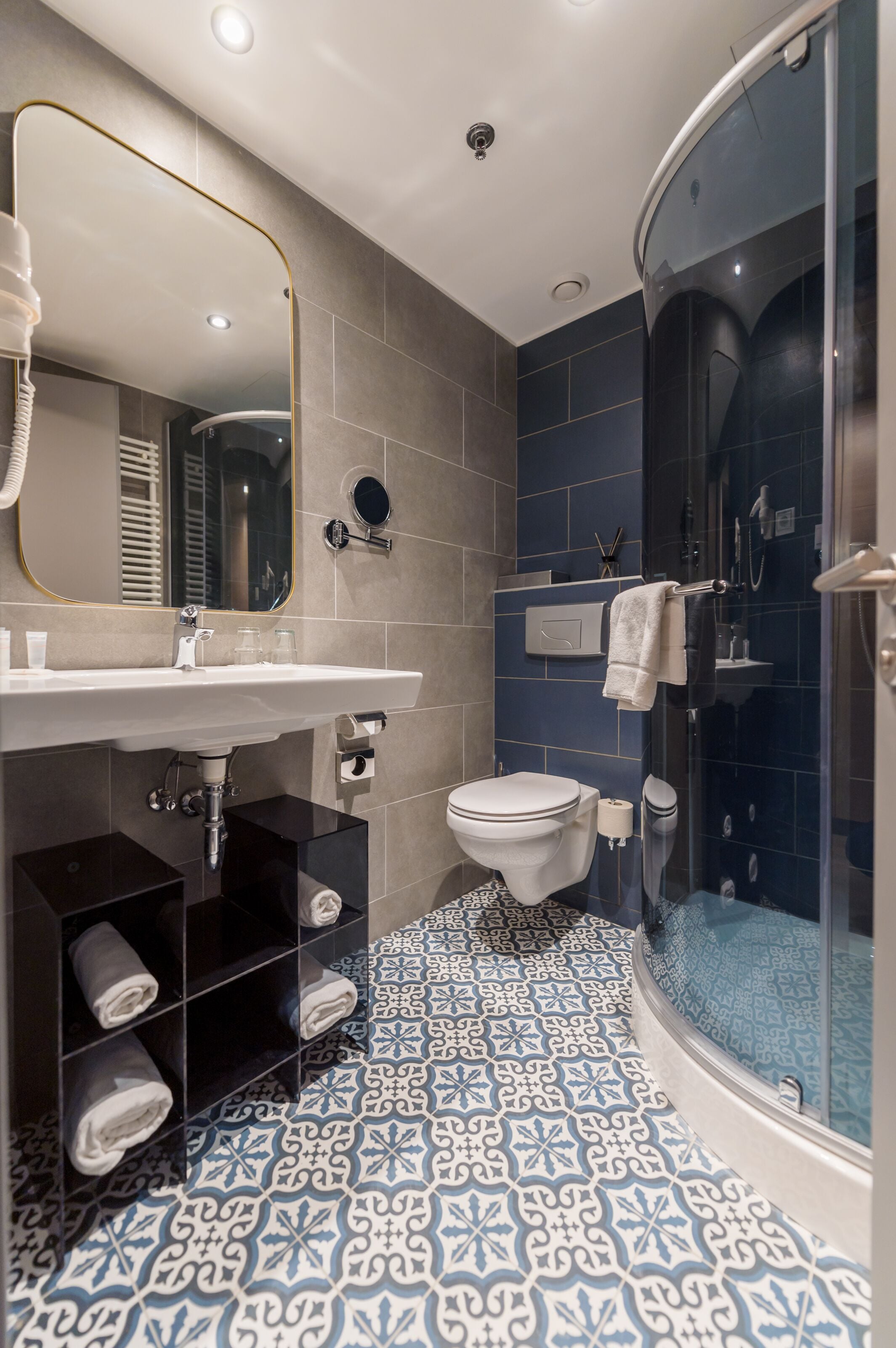 free toiletries, hair dryer, towels, shampoo