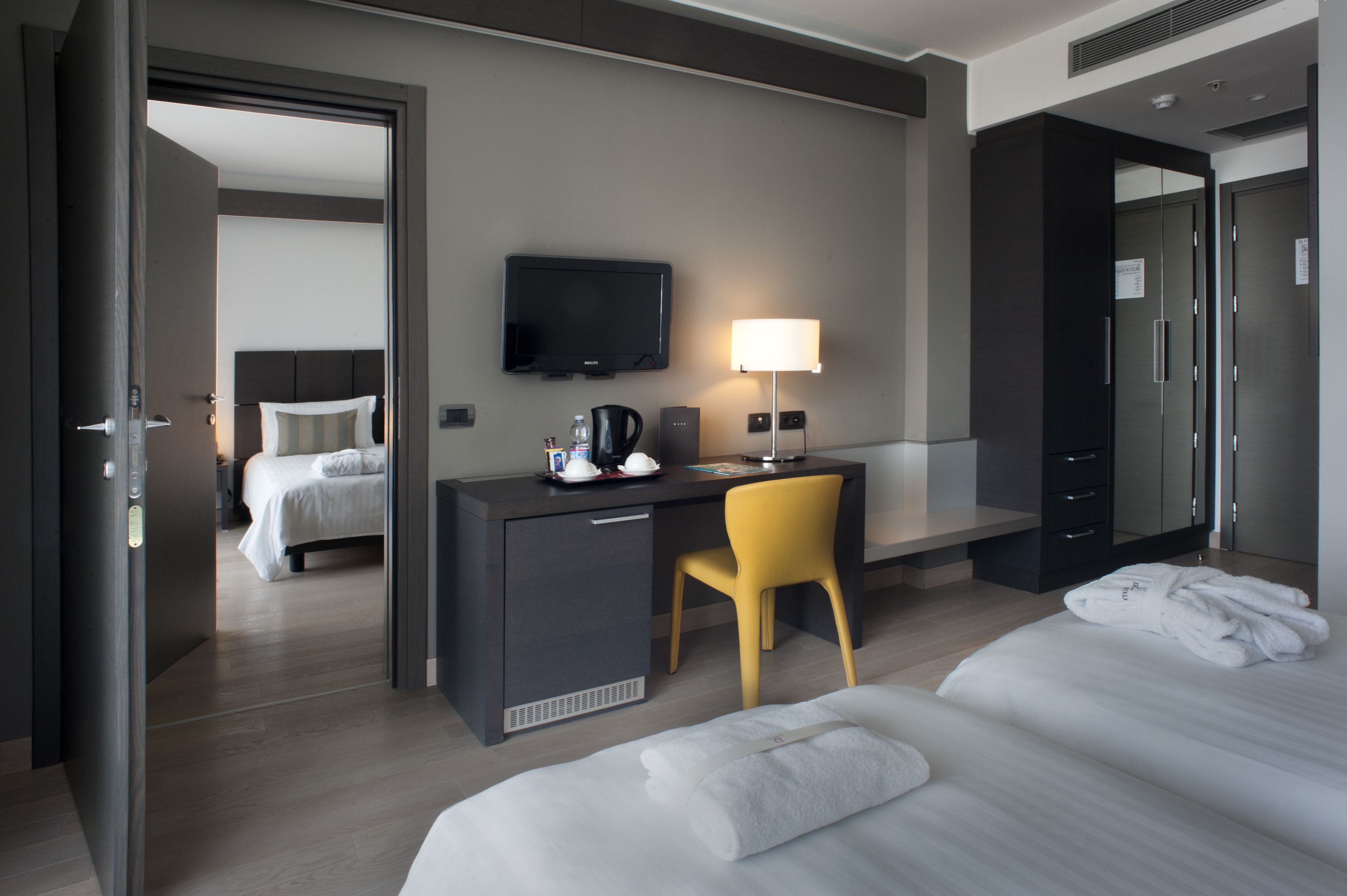 family room, multiple beds (deluxe) | hypo-allergenic bedding, down duvets, minibar, in-room safe