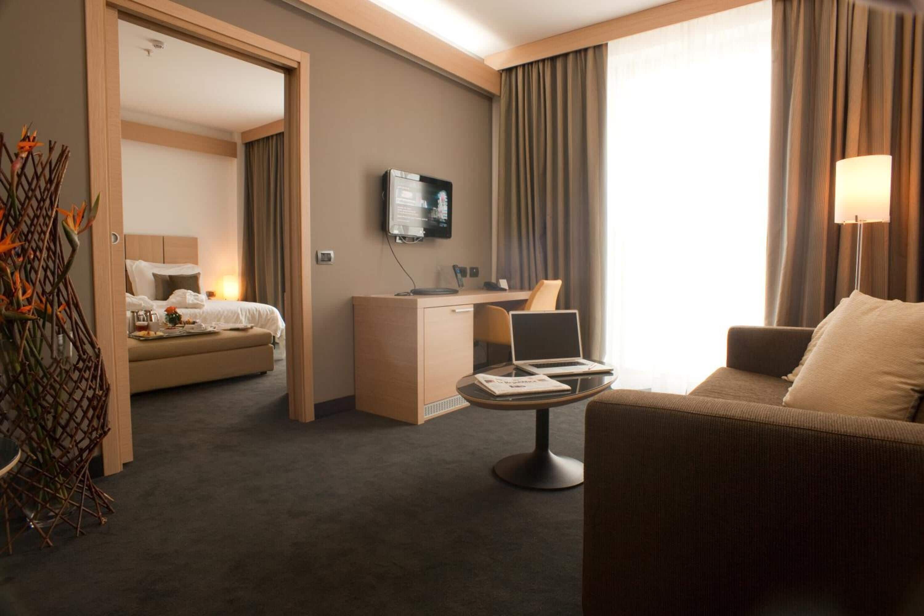 family room, multiple beds (deluxe) | hypo-allergenic bedding, down duvets, minibar, in-room safe