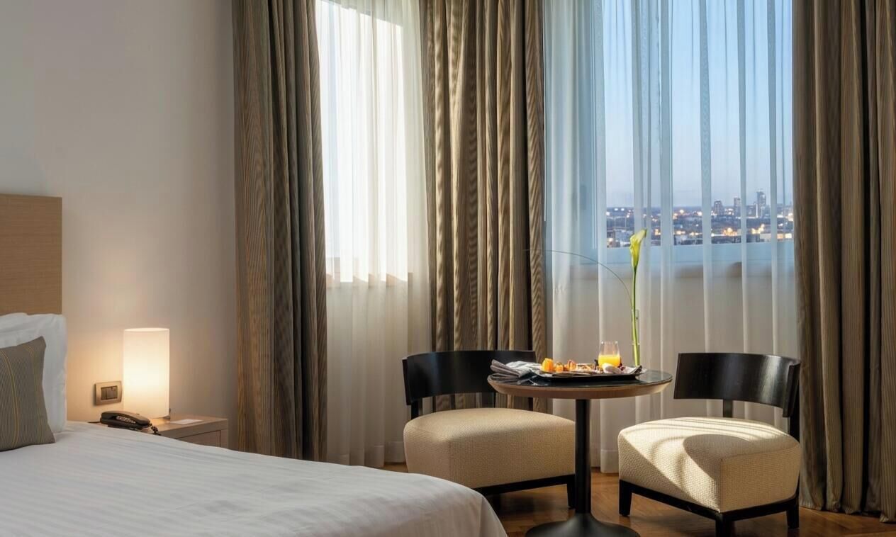 Camera Executive con letto matrimoniale o 2 letti singoli | Biancheria da letto ipoallergenica, copriletto in piuma, minibar