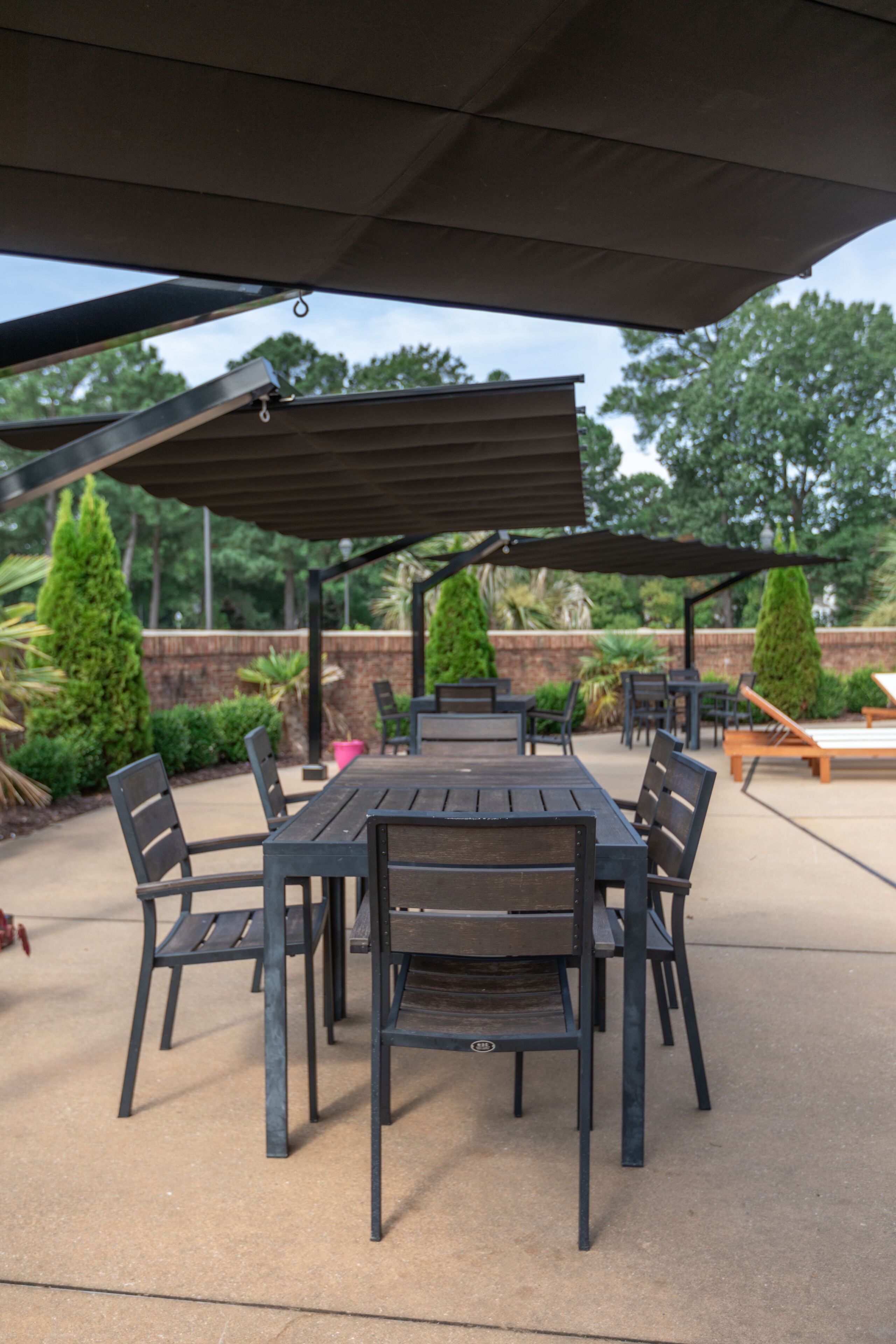 seasonal outdoor pool, open 9:00 am to 7:00 pm, pool umbrellas