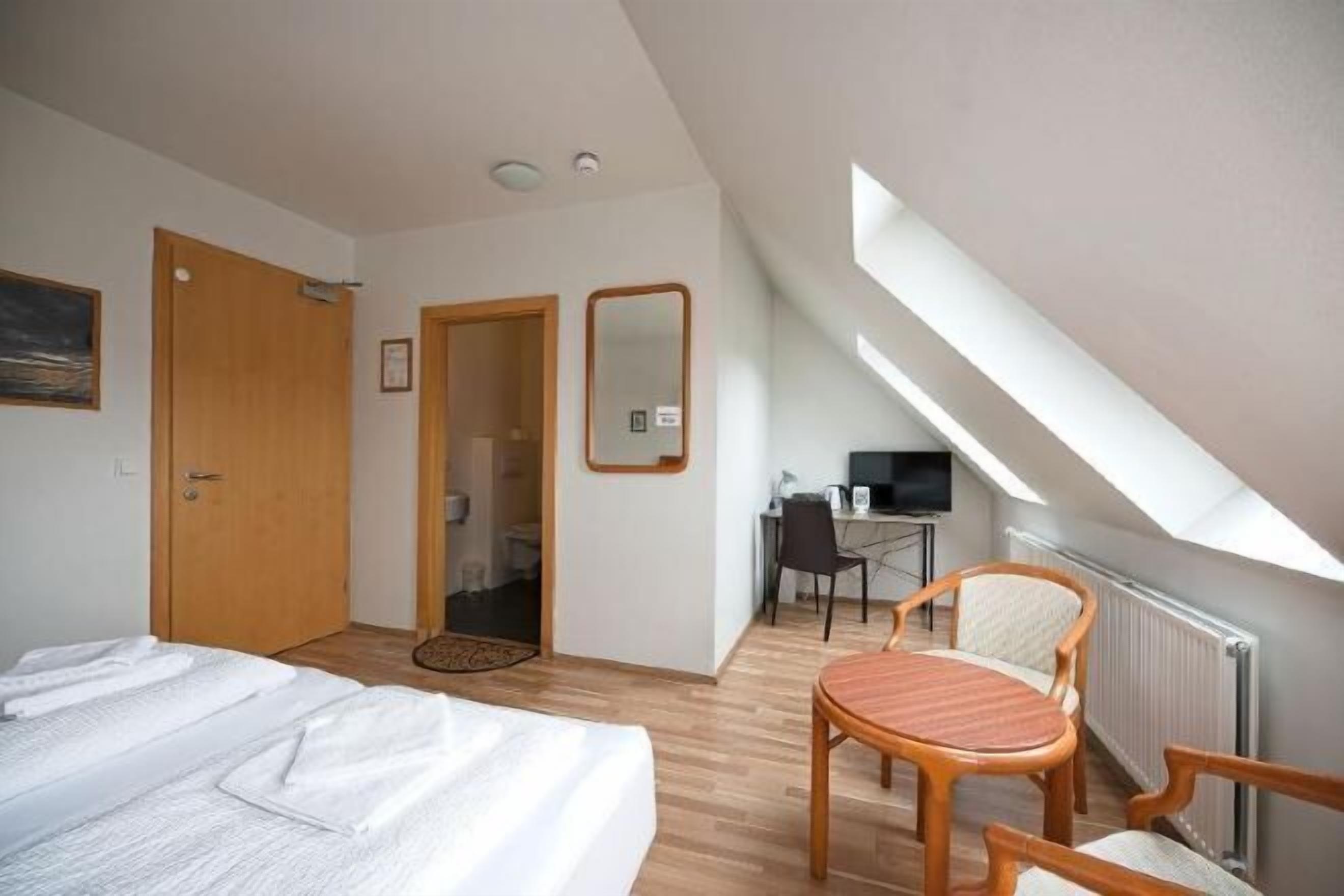 Desk, soundproofing, iron/ironing board, rollaway beds