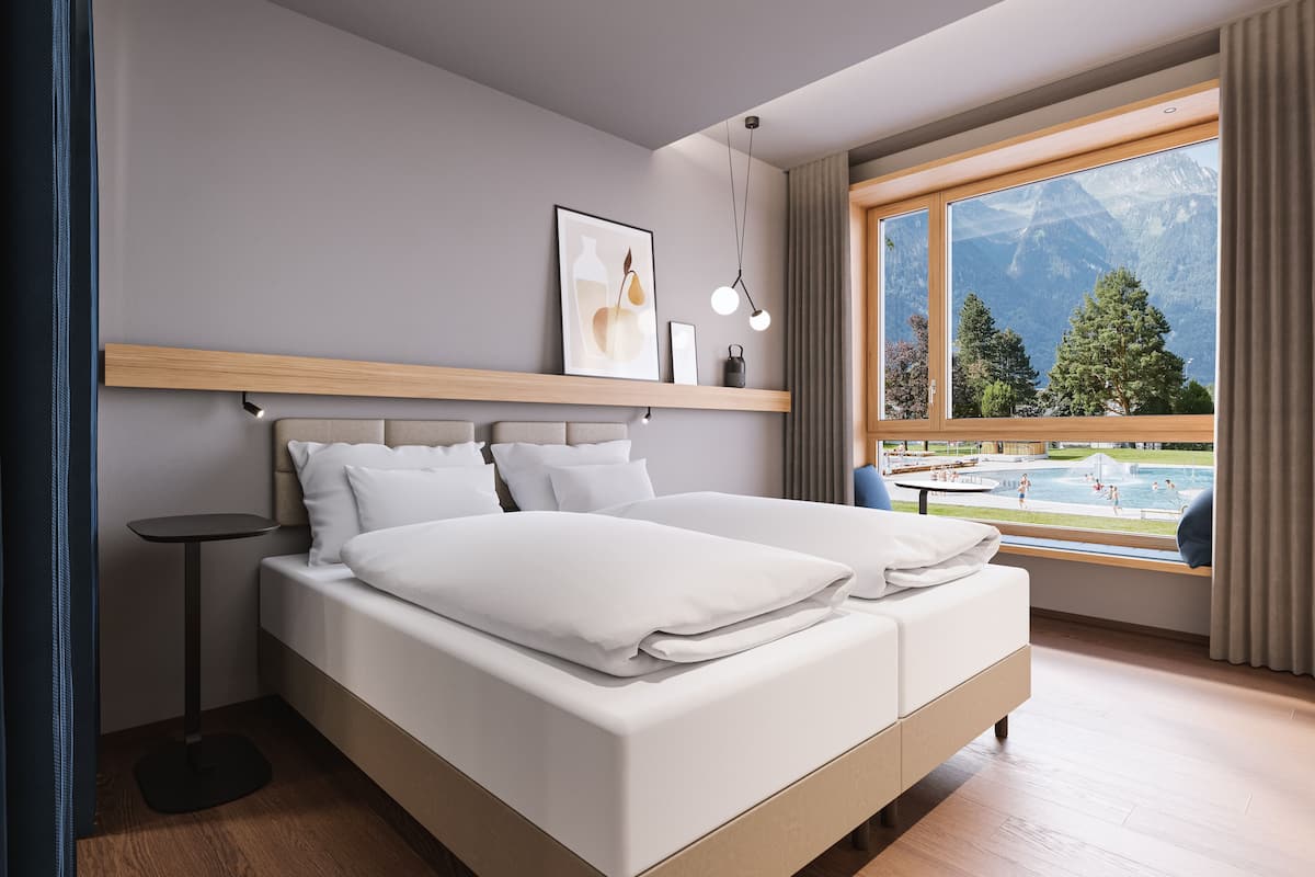 Single Room | Premium bedding, desk, blackout curtains, cots/infant beds