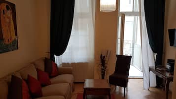 Comfort Apartment, 2 Bedrooms, Balcony | Living room | Flat-screen TV, DVD player