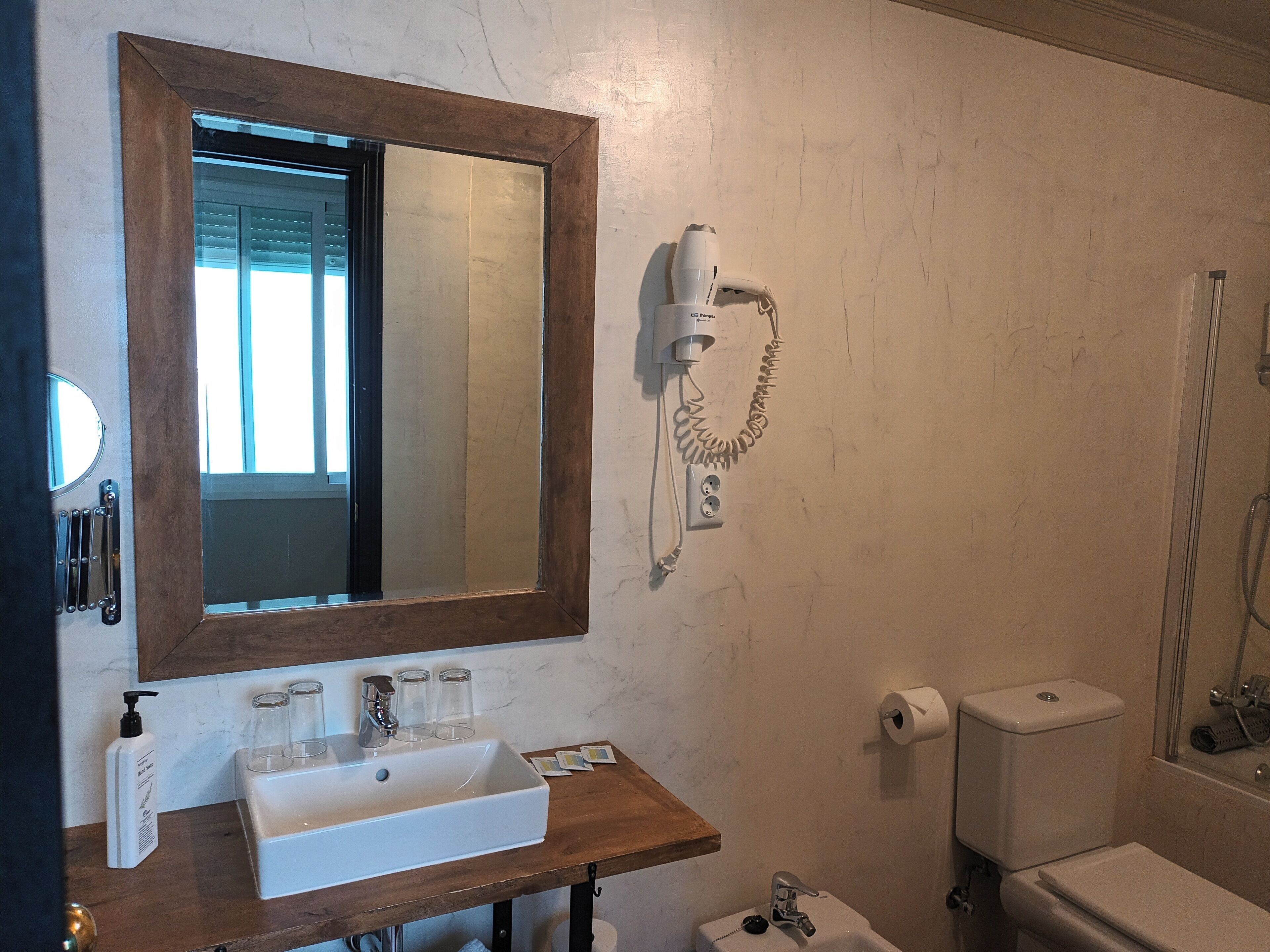 room, multiple beds | bathroom | hair dryer, towels