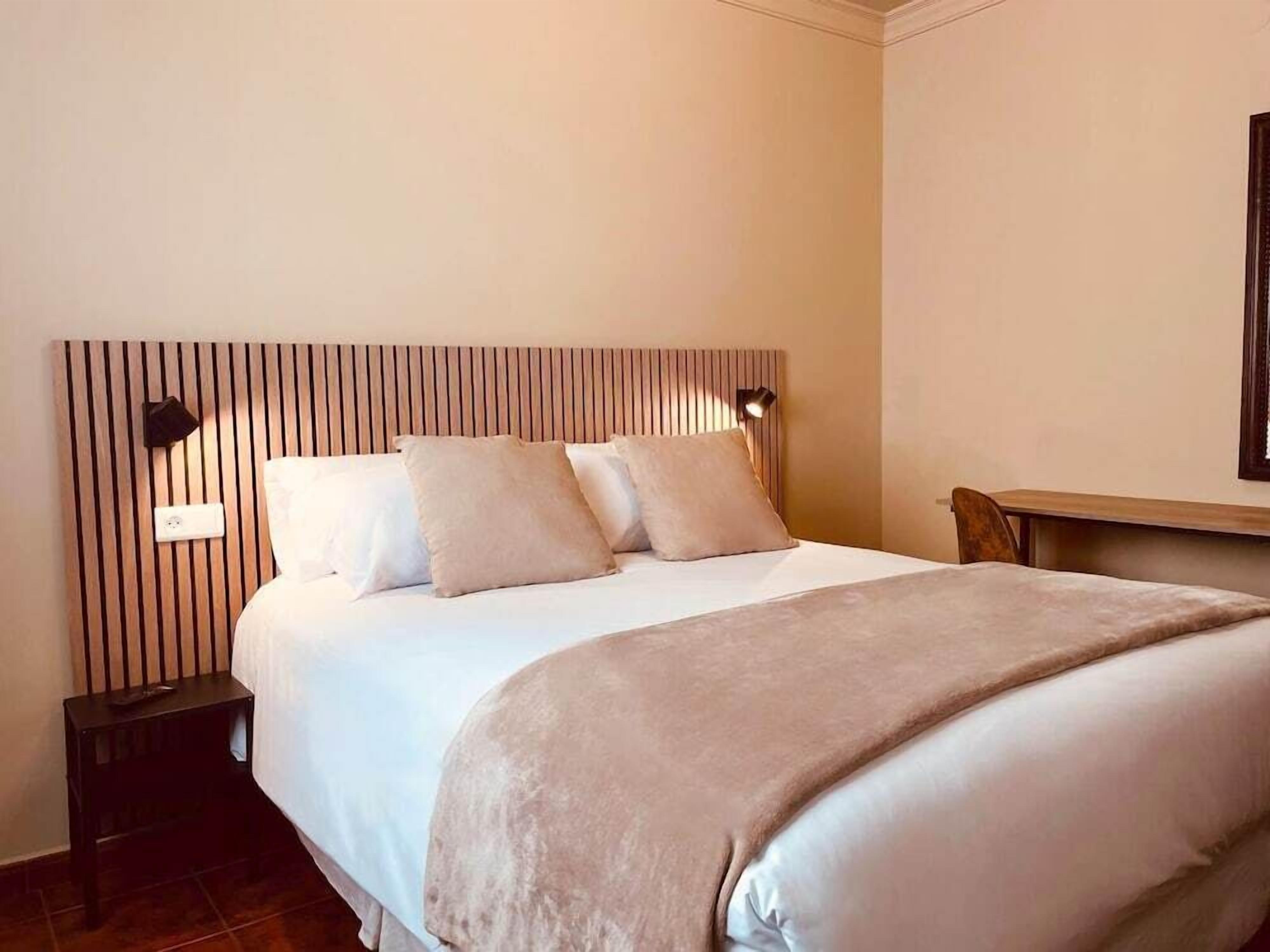 Desk, free WiFi, bed sheets