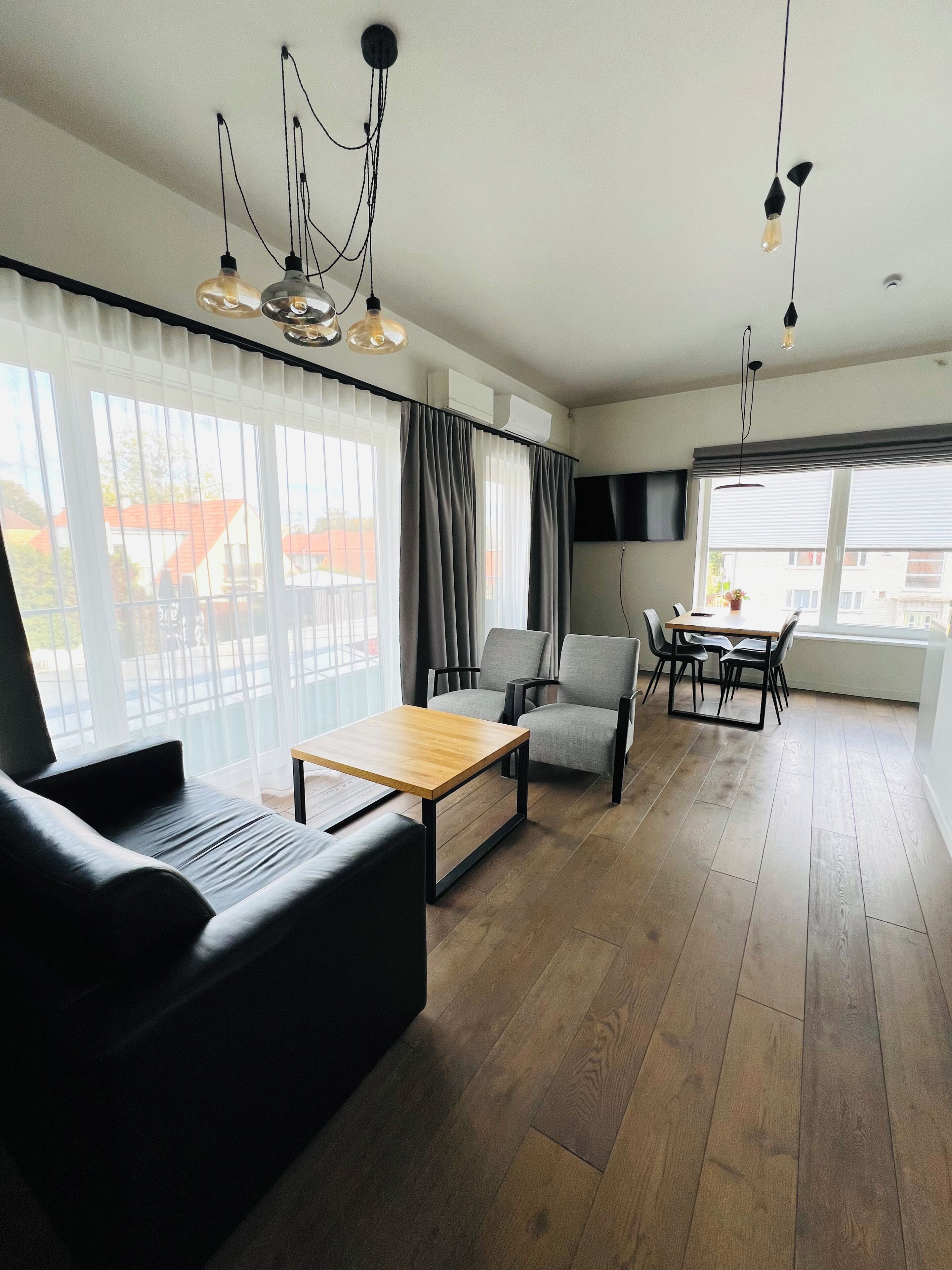 Comfort Apartment | Minibar, in-room safe, desk, iron/ironing board