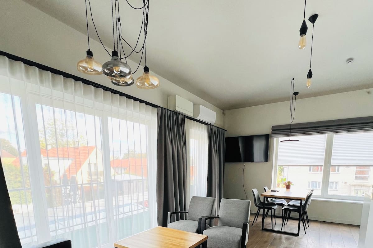 Comfort Apartment | Minibar, in-room safe, desk, iron/ironing board