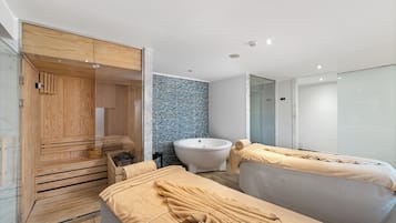 Couples treatment rooms, sauna, hot tub, steam room, hot stone massages