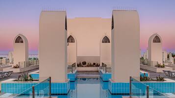 9 outdoor pools, pool umbrellas, pool loungers